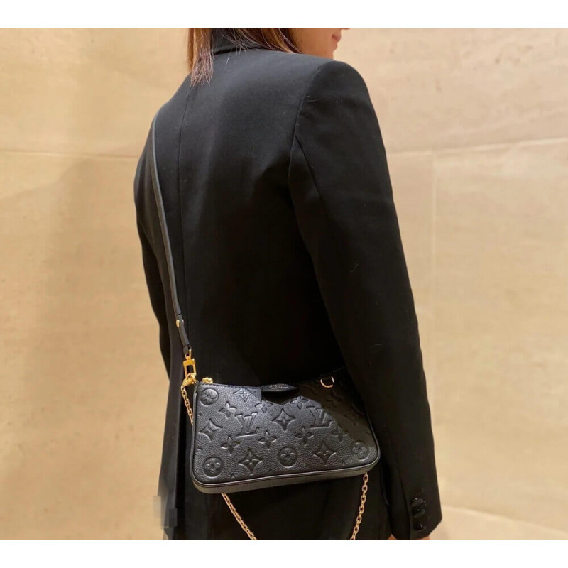 Louis Vuitton Monogram Empreinte Easy Pouch On Strap  Neutrals Mini Bags  Handbags  LOU742603  The RealReal