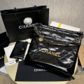 Chanel 22 Small Handbag Shiny Calfskin Black Gold